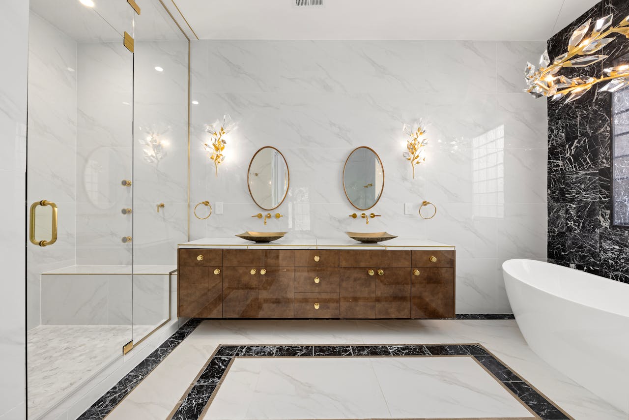 gallery-6 Elegant bathroom in Denver showcasing luxury marble and modern fixtures.